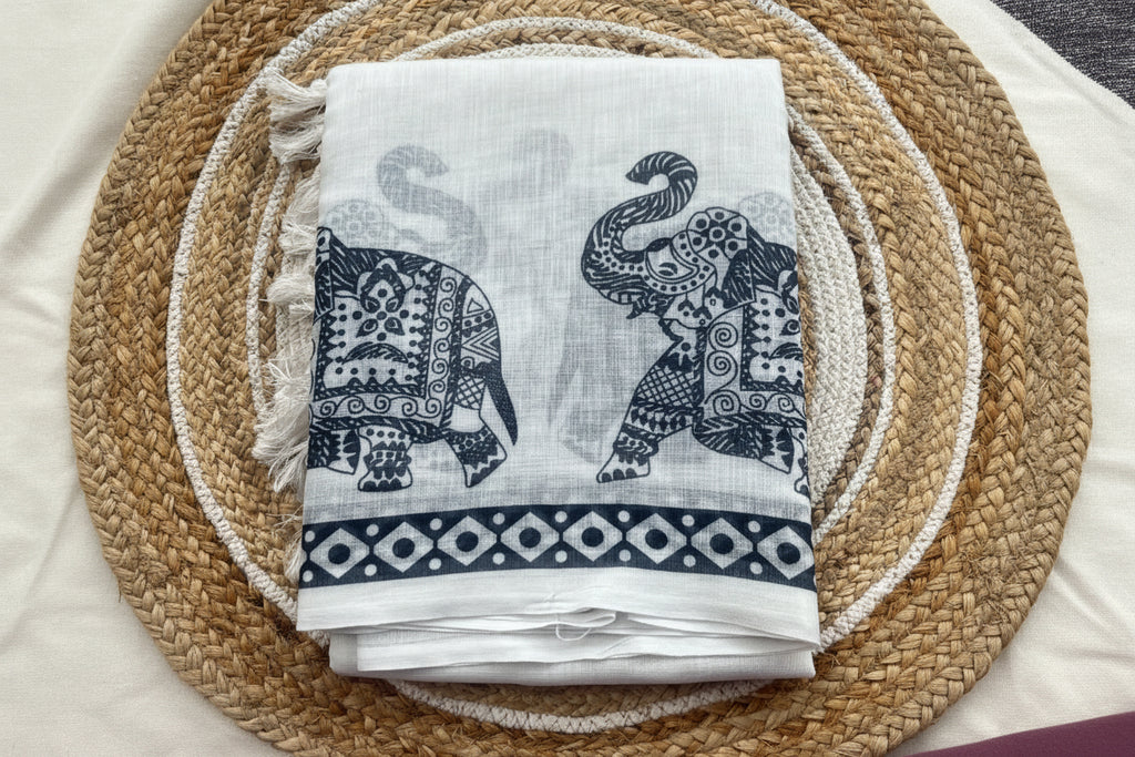 Elephant motif white linen saree