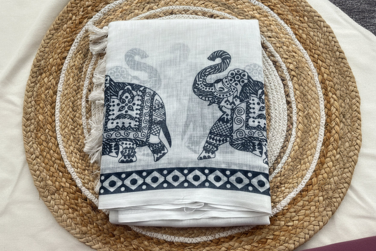 Elephant motif white linen saree