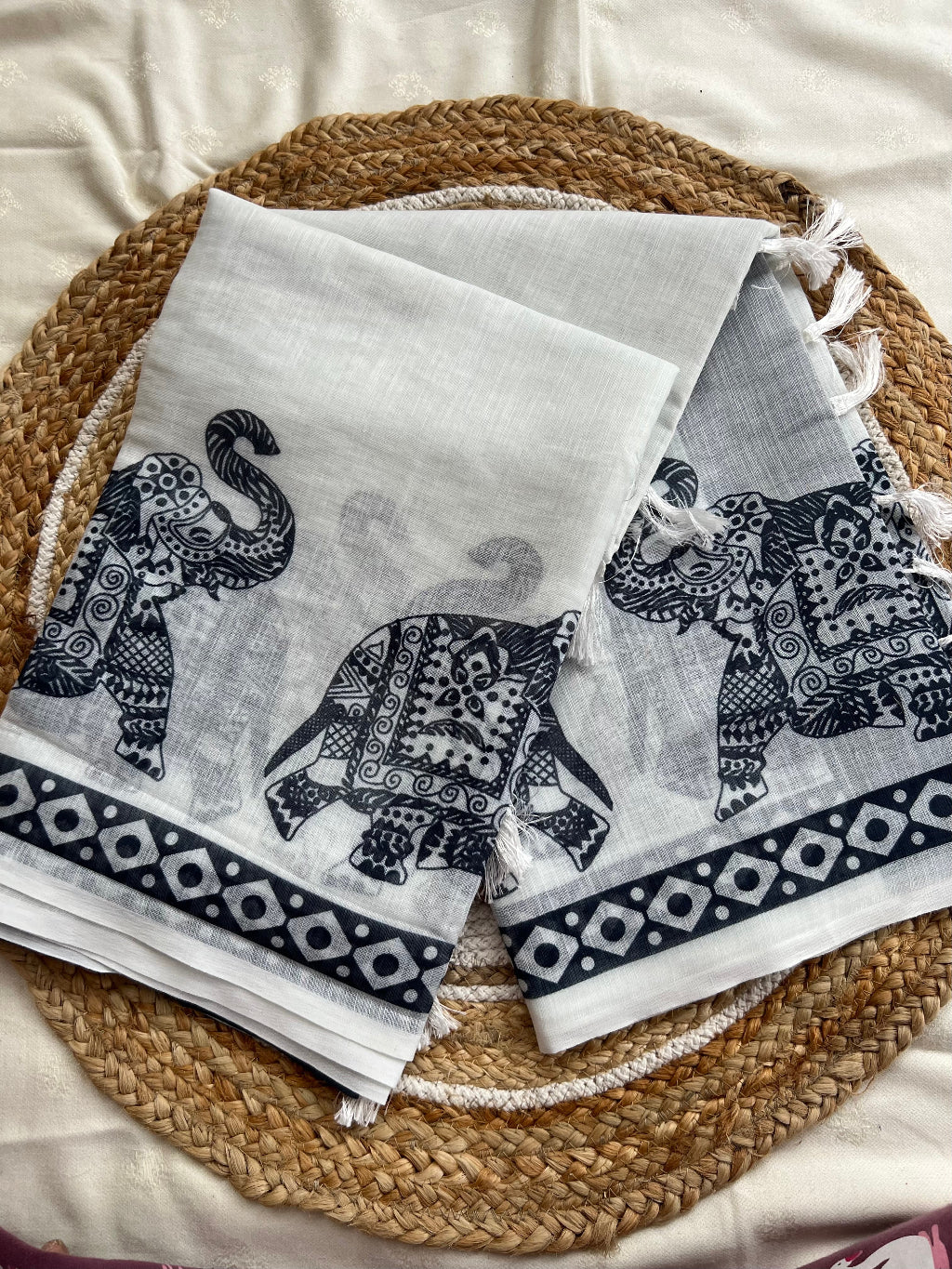 Elephant motif white linen saree