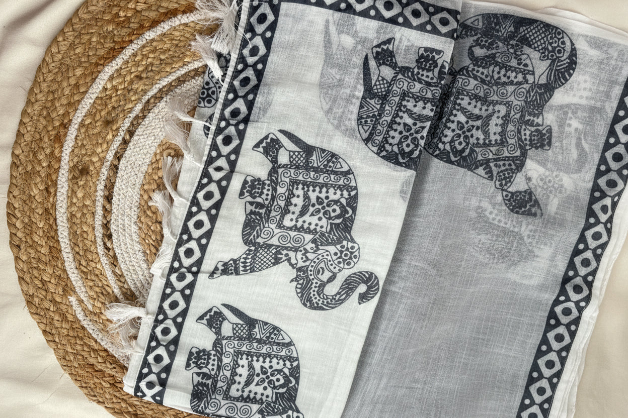 Elephant motif white linen saree