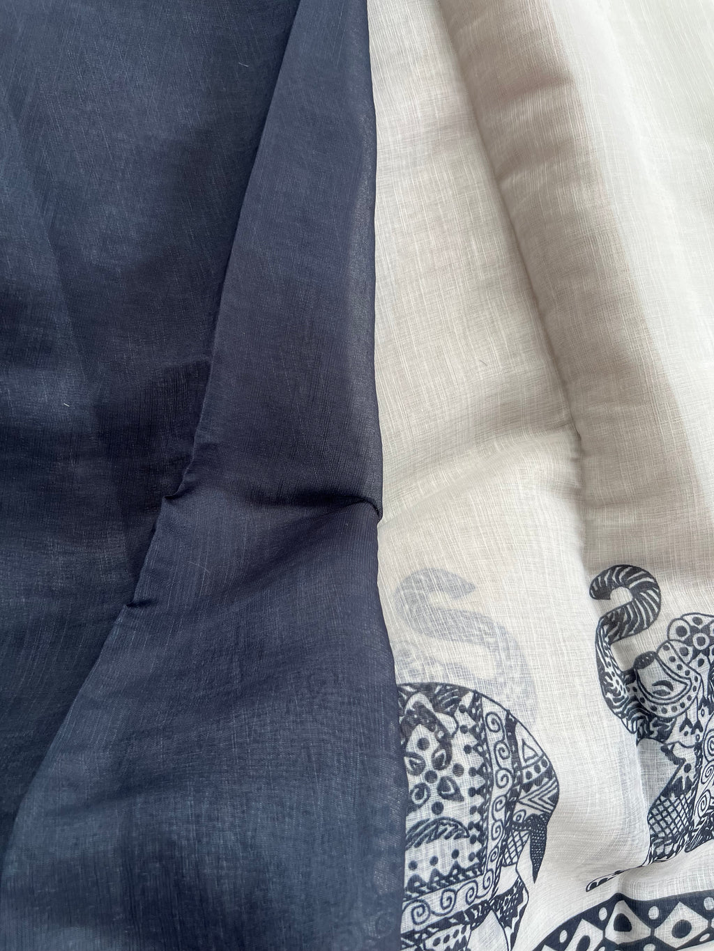 Elephant motif white linen saree