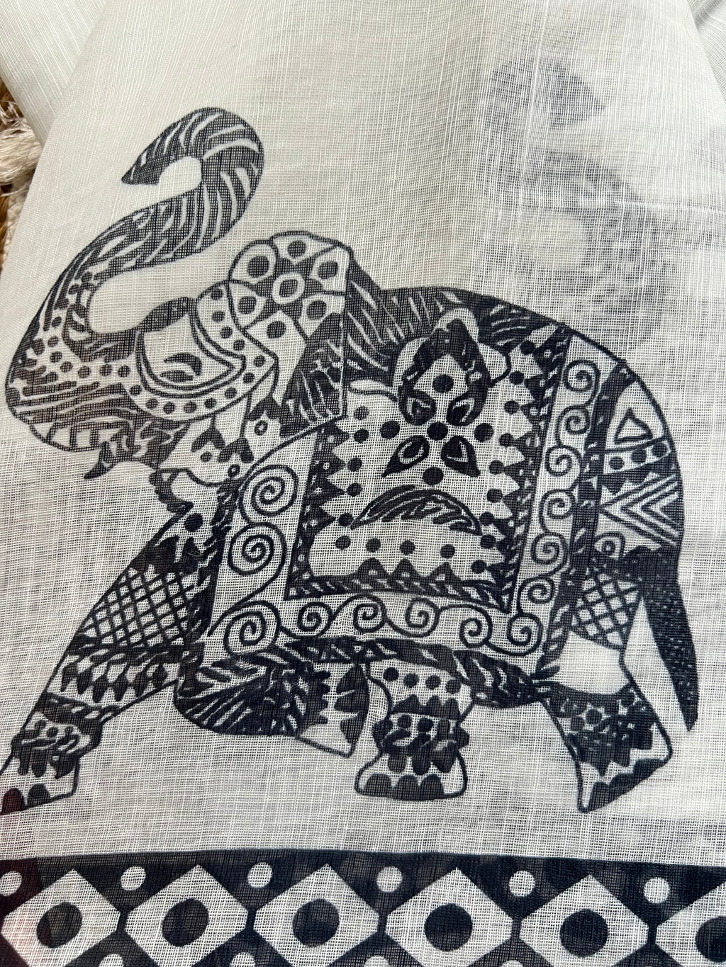 Elephant motif white linen saree