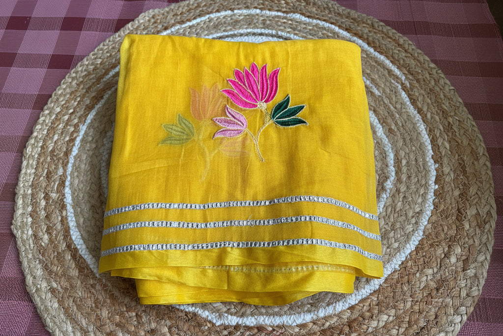 Yellow lotus flower embroidery mul cotton saree