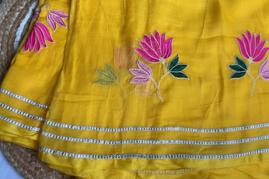 Yellow lotus flower embroidery mul cotton saree
